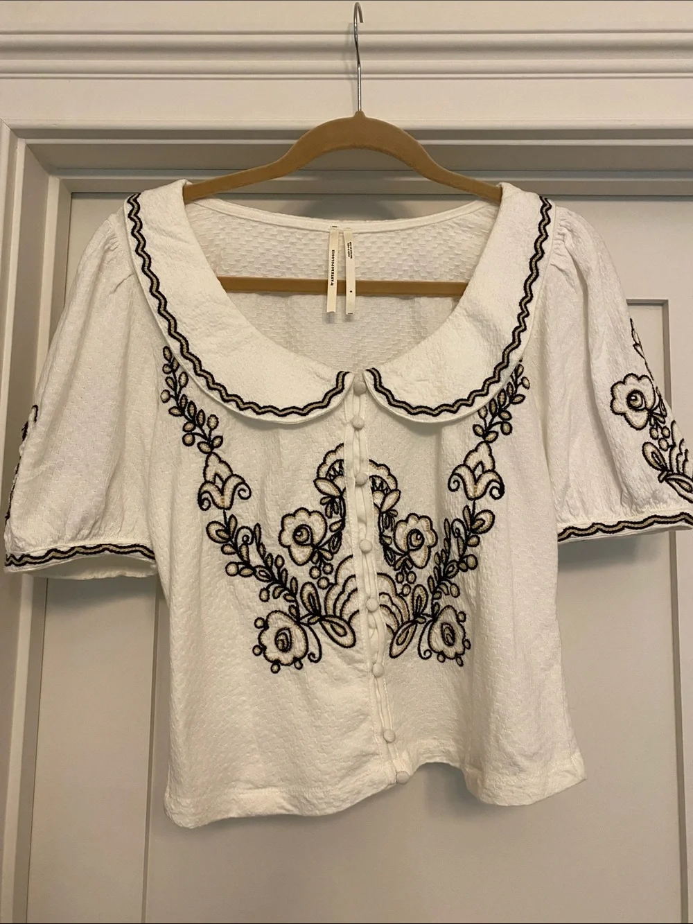 By Anthropologie White Blouse with Black Floral Embroidery